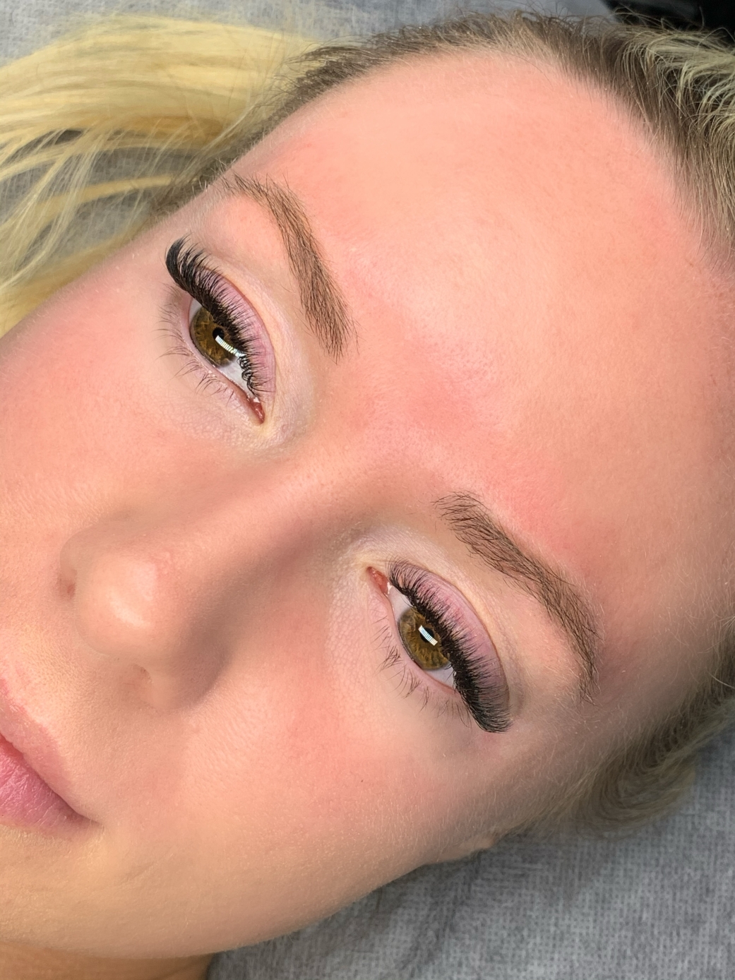 Eyebrows before brow lamination lashed and proud